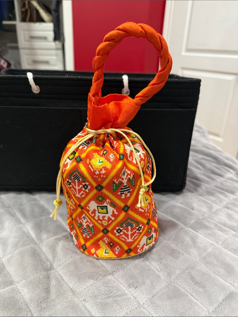 Orange Patterned Drawstring Handbag